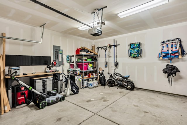 9712 Fanning Basket Ln, Ladson, SC 29456 - garage featuring a garage door opener and electric panel