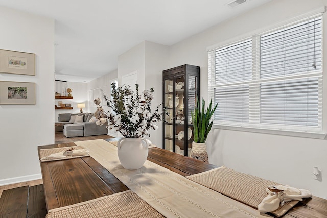 9712 Fanning Basket Ln, Ladson, SC 29456 - dining area with wood finished floors and baseboards