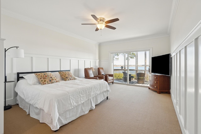 carpeted bedroom featuring ceiling fan, access to exterior, and crown molding