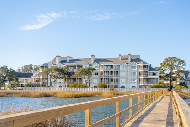 dock area with a water view