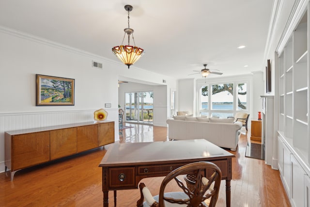 interior space featuring light hardwood / wood-style flooring and ornamental molding