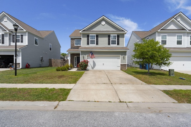 view of front of property featuring driveway, a front yard, a garage, brick siding, and fence
