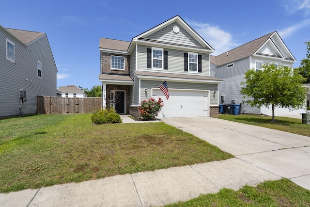traditional home featuring fence, a front yard, brick siding, an attached garage, and driveway