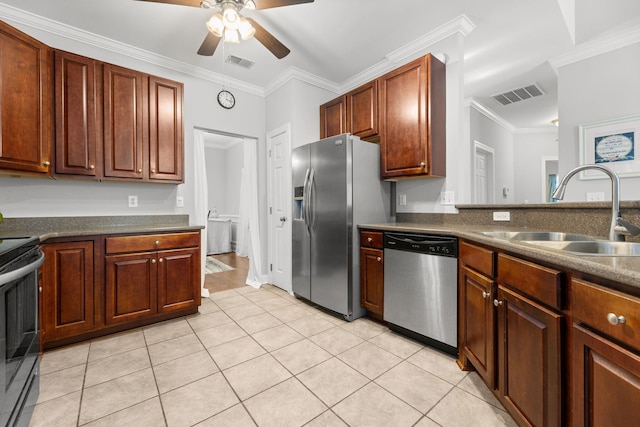 kitchen with stainless steel appliances, ceiling fan, crown molding, sink, and light tile patterned floors