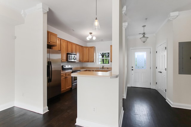 kitchen with a sink, electric panel, stainless steel appliances, light countertops, and dark wood-type flooring