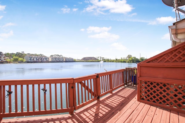 deck featuring a water view