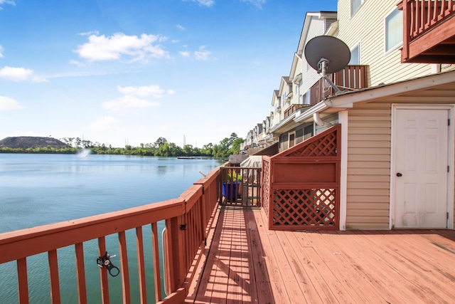 deck featuring a water view