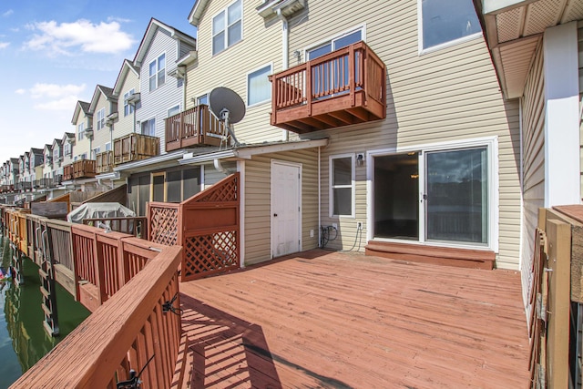 wooden deck with a residential view