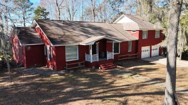 view of front of property with a garage