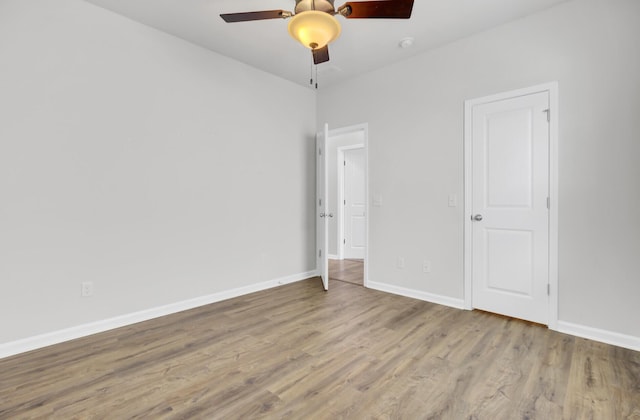 121 Ancestry Ln, Moncks Corner, SC 29461 - unfurnished bedroom with wood finished floors, baseboards, and a ceiling fan