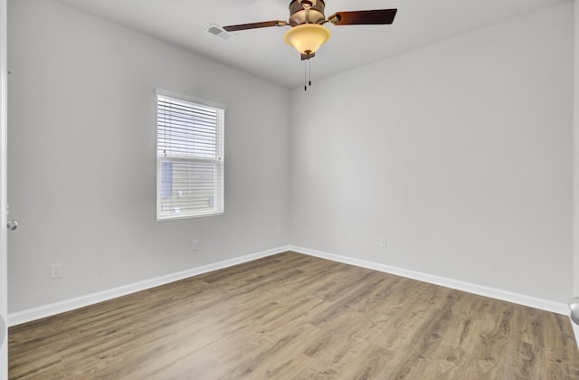 121 Ancestry Ln, Moncks Corner, SC 29461 - unfurnished room with baseboards and wood finished floors