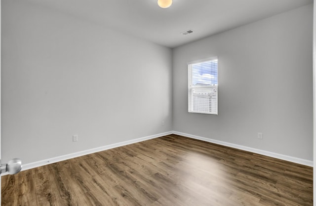121 Ancestry Ln, Moncks Corner, SC 29461 - spare room with dark wood-type flooring and baseboards