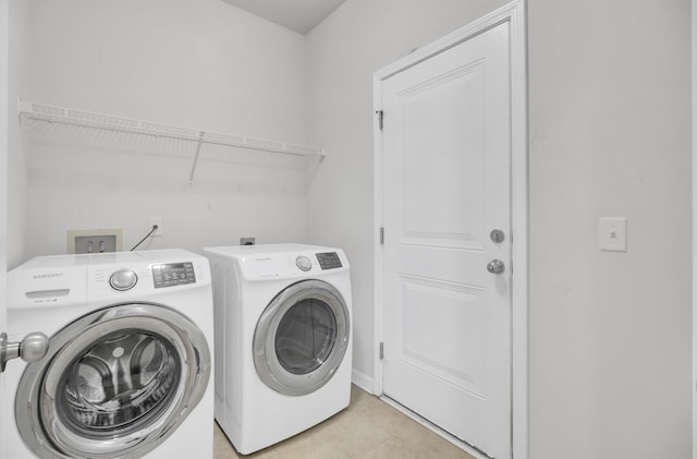 121 Ancestry Ln, Moncks Corner, SC 29461 - laundry room with washing machine and clothes dryer and light tile patterned floors