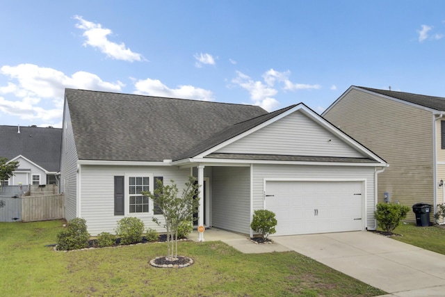121 Ancestry Ln, Moncks Corner, SC 29461 - view of front of home with an attached garage, driveway, and a shingled roof