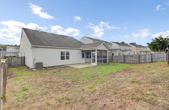 121 Ancestry Ln, Moncks Corner, SC 29461 - rear view of house with a sunroom, a patio area, central air condition unit, and roof with shingles