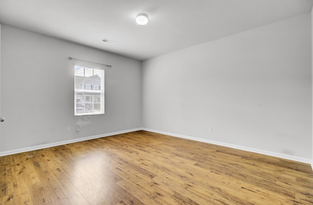 121 Ancestry Ln, Moncks Corner, SC 29461 - spare room featuring light wood-style flooring and baseboards