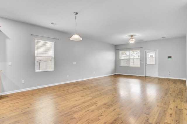 121 Ancestry Ln, Moncks Corner, SC 29461 - empty room with ceiling fan, light wood-style flooring, and baseboards