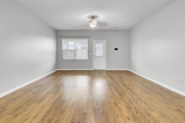 121 Ancestry Ln, Moncks Corner, SC 29461 - empty room featuring ceiling fan, wood finished floors, and baseboards