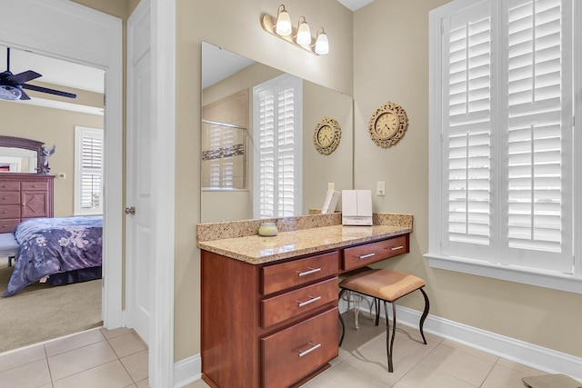 bathroom with ceiling fan, tile patterned flooring, and walk in shower