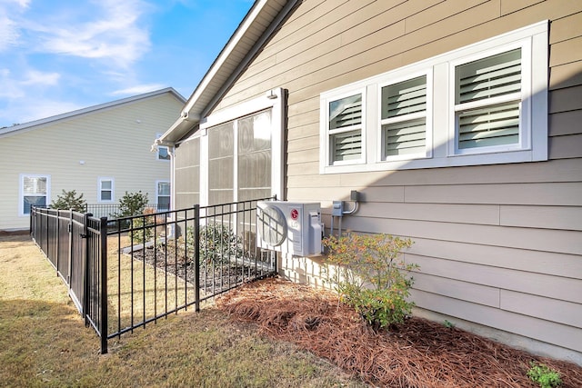 view of home's exterior with ac unit