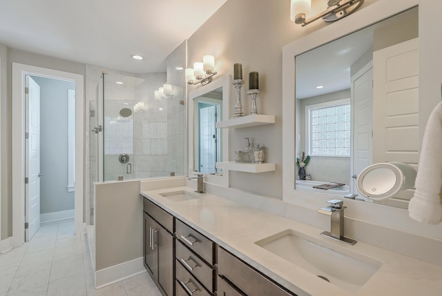 bathroom with tile patterned flooring, an enclosed shower, and vanity