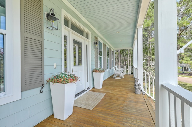 wooden deck featuring a porch