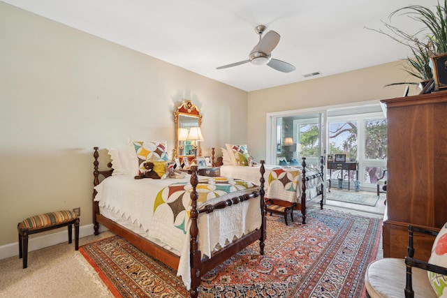 bedroom with access to outside, ceiling fan, carpet, baseboards, and visible vents