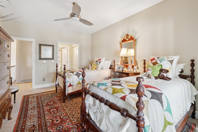 bedroom with carpet floors, baseboards, and ceiling fan