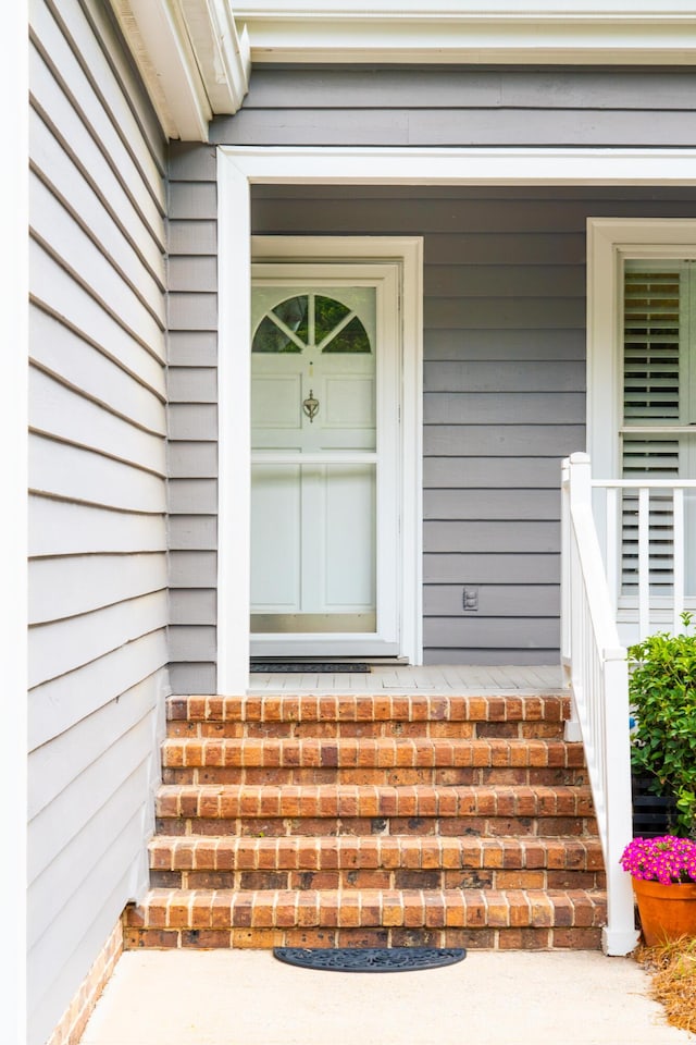 property entrance featuring covered porch