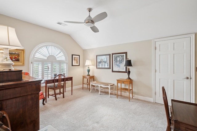 office area featuring ceiling fan, carpet, baseboards, vaulted ceiling, and visible vents