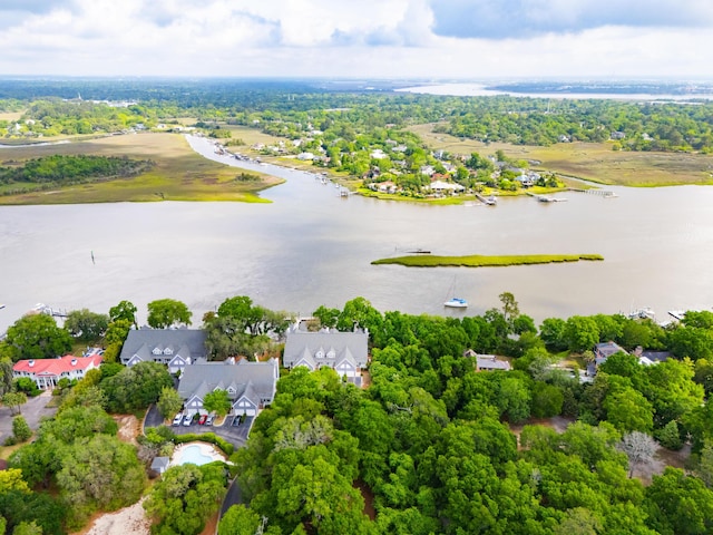 drone / aerial view with a water view and a residential view