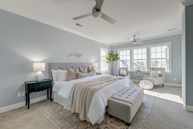 bedroom with visible vents, multiple windows, and carpet