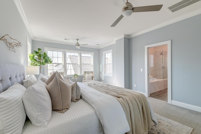 carpeted bedroom featuring visible vents, baseboards, and ornamental molding