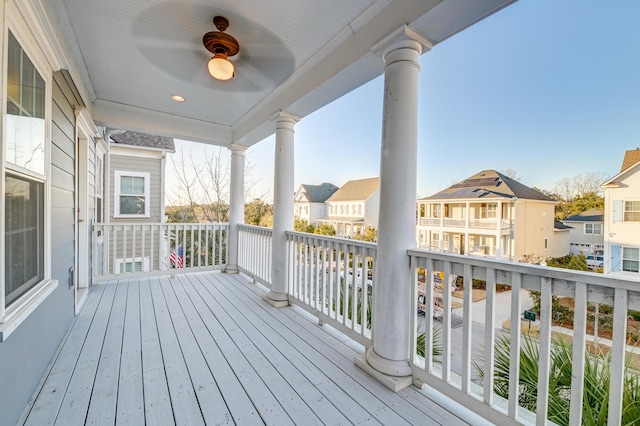 wooden terrace featuring a residential view