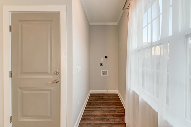 hall featuring dark wood-style floors, crown molding, and baseboards