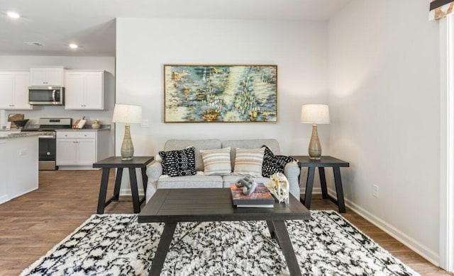 living room with hardwood / wood-style flooring