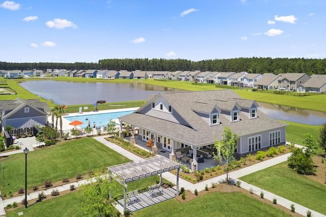 bird's eye view featuring a residential view and a water view