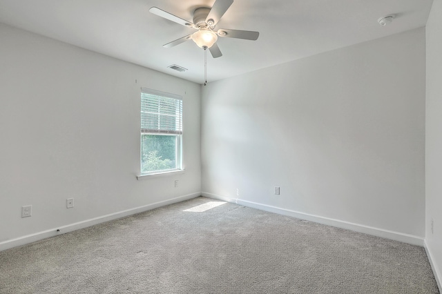 211 Saxony Loop, Summerville, SC 29486 - empty room with a ceiling fan, baseboards, carpet, and a smoke detector