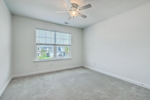 211 Saxony Loop, Summerville, SC 29486 - spare room with carpet flooring, baseboards, and ceiling fan