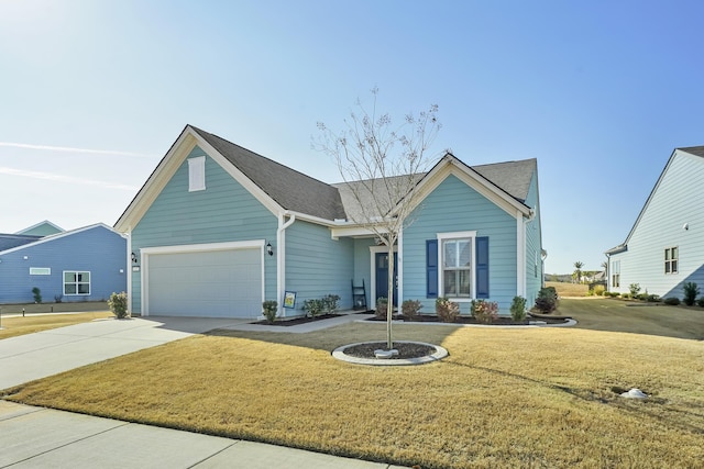 single story home featuring a garage, a front yard, concrete driveway, and roof with shingles