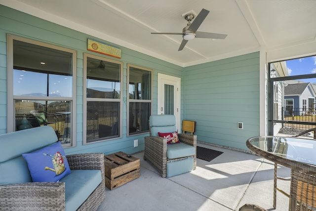 view of patio / terrace featuring ceiling fan