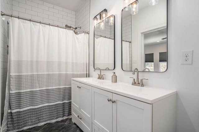 bathroom with tile patterned flooring, vanity, and a shower with shower curtain