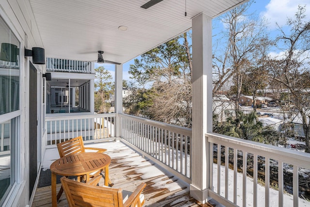 snow covered deck with ceiling fan