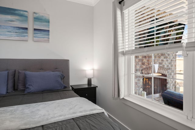 bedroom featuring baseboards