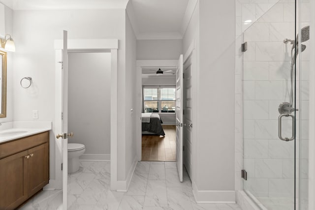 full bath with ornamental molding, a stall shower, marble finish floor, and baseboards