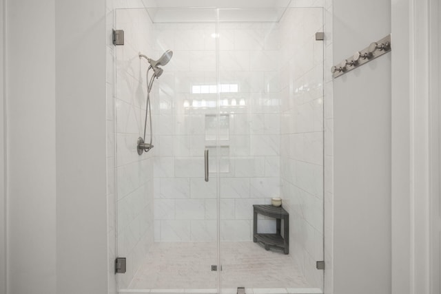 bathroom with a stall shower