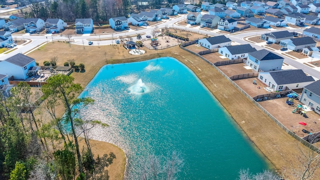 birds eye view of property with a residential view