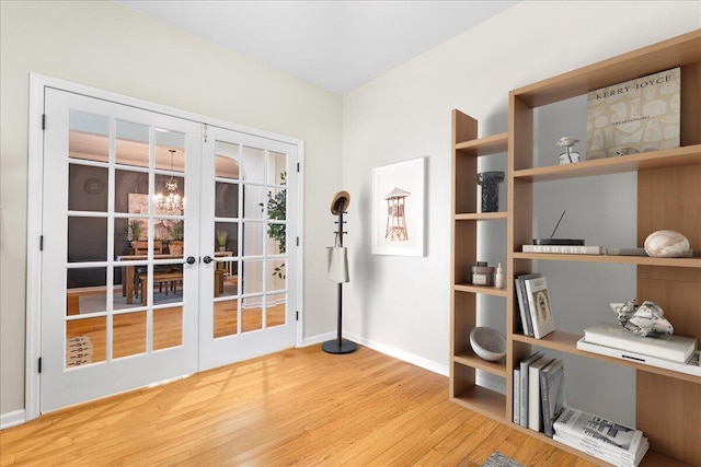 555 Pointe Of Oaks Rd, Summerville, SC 29485 - doorway to outside with wood finished floors, french doors, and baseboards
