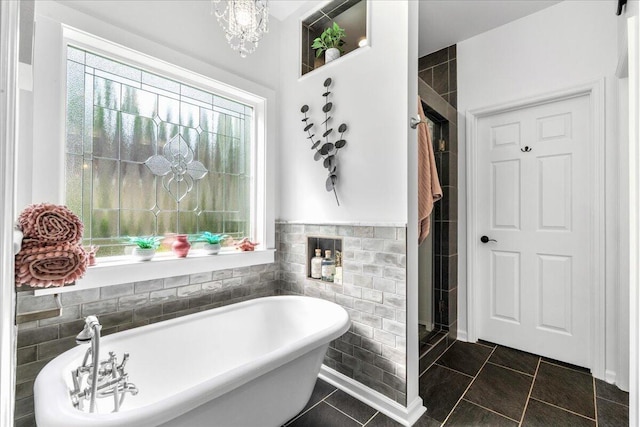 555 Pointe Of Oaks Rd, Summerville, SC 29485 - full bath with tile walls, a soaking tub, and a stall shower