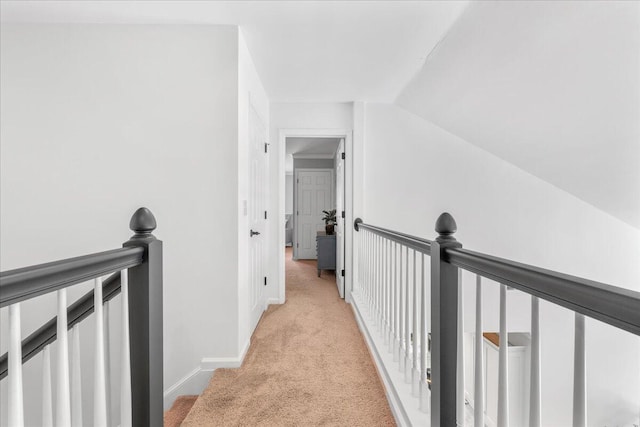 555 Pointe Of Oaks Rd, Summerville, SC 29485 - hall with an upstairs landing, light carpet, baseboards, and lofted ceiling